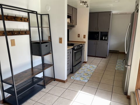Fully furnished kitchen and back entryway