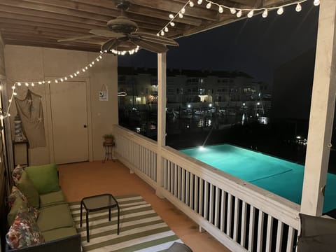 Night view of pool and marina