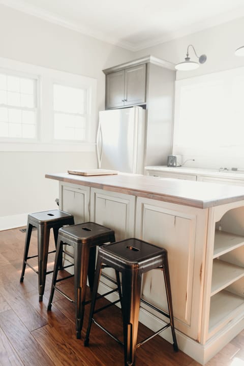 Kitchen island seats three guests.