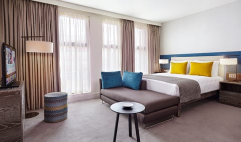 Relax on the comfy bed after a day outside.