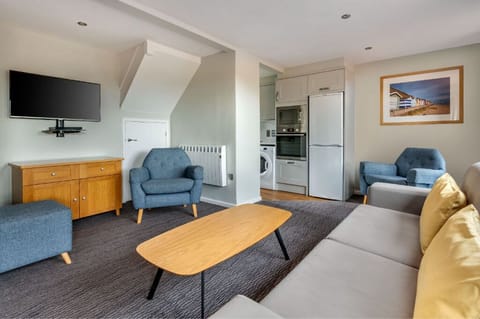 Inviting living room with ample seating and a homely atmosphere