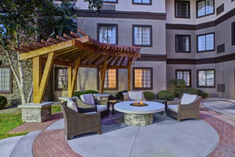 Chat with friends and family on the outdoor patio.