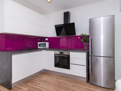 Countertop, Cabinetry, Building, Furniture, Kitchen Stove, Kitchen, Product, Drawer, Purple, Tap