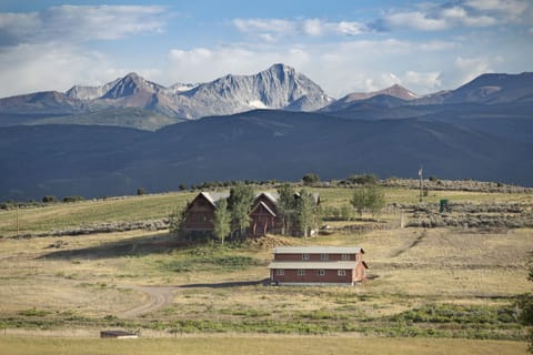 Your home is the red building in the foreground. Capitol Peak/Mt. Sopris views.