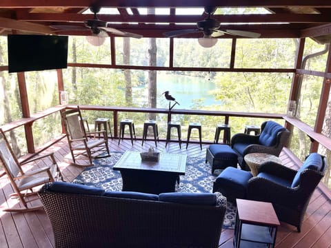 Screen porch overlooking quiet cove on Lake Keowee.  New furniture and TV!