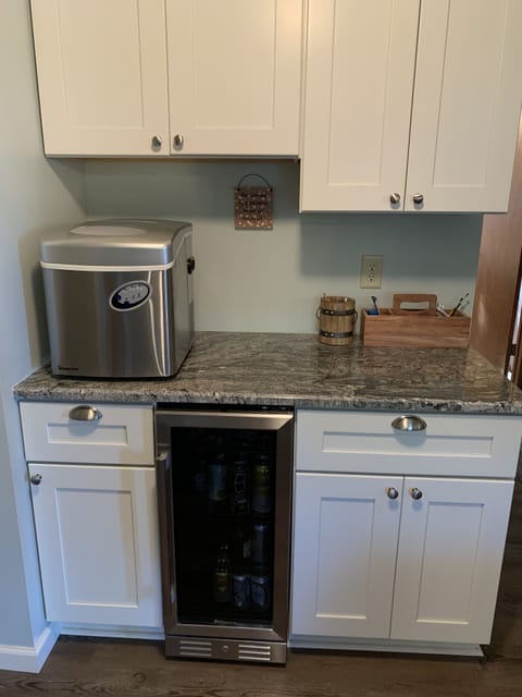 Additional ice maker and beverage cooler.
