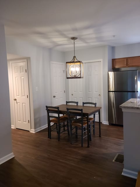 Modern kitchen with granite and stainless steel appliances.