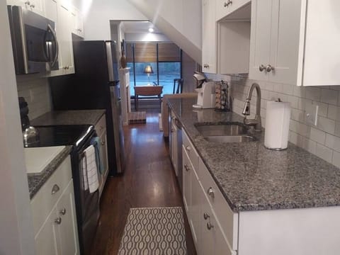 Fully equipped new kitchen, granite, tile backsplash, ss, keurig,   2 zone wine fridge, microwave, mini blender, mixing bowls, pots and pans, bake-ware and utensils, etc.