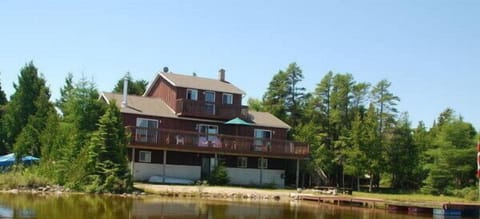 View from the lake looking toward cottage and lakeside.