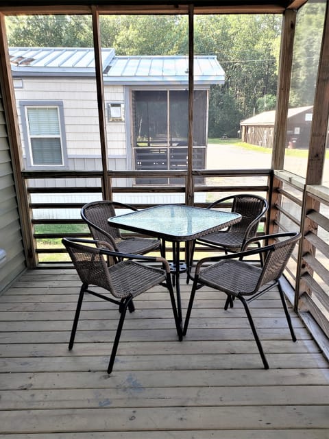Screened porch with outdoor seating