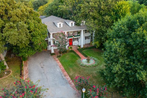 In an older neighborhood, has 3 lots, hundreds of shade trees, and privacy