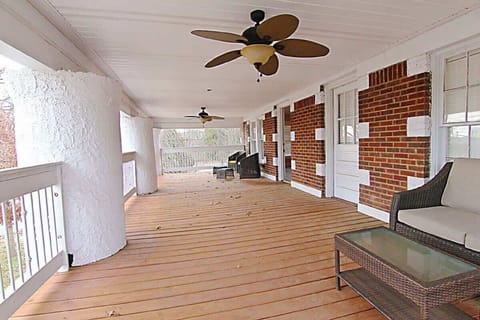 Large shared outdoor balcony with separate entrance from living rooms.