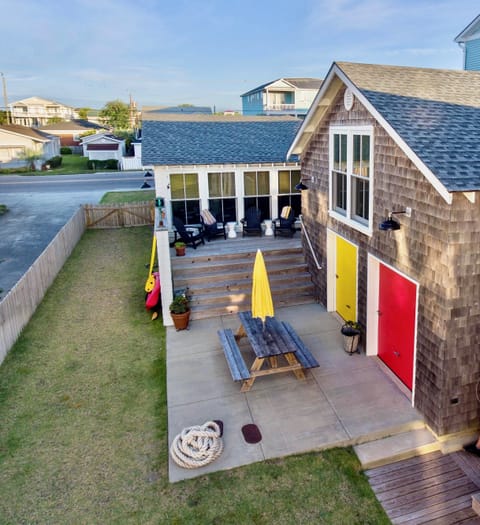 You get access to the Cottage, Yellow Garage, Clubhouse above, & yard in front.