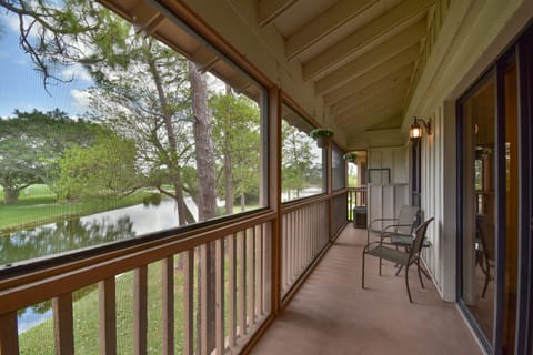 Screened in porch overlooking the water and championship golf course