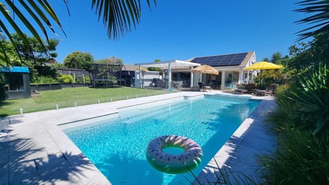 Family-friendly home designed for easy summer living