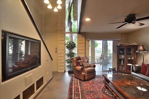Living Room, facing Front Door and Downstairs Patio.