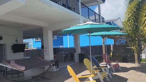 hammock with coffee set and a 40 inch TV