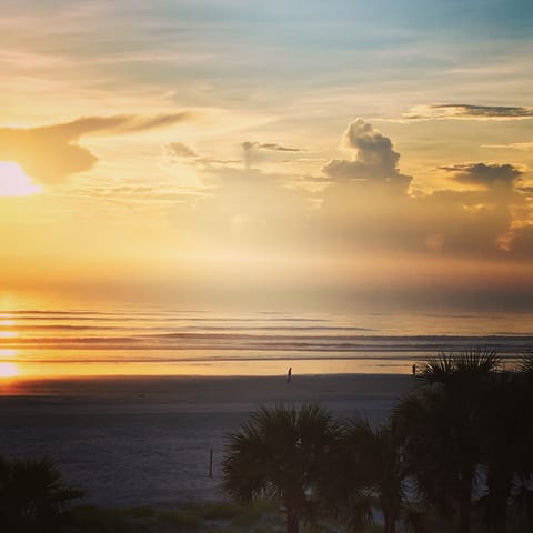 Morning walk to the beach with your coffee!
