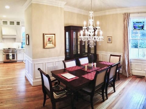Dining room, partially open to kitchen and breakfast nook