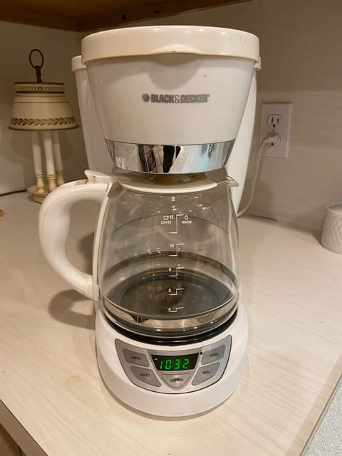 Coffee maker available in kitchen