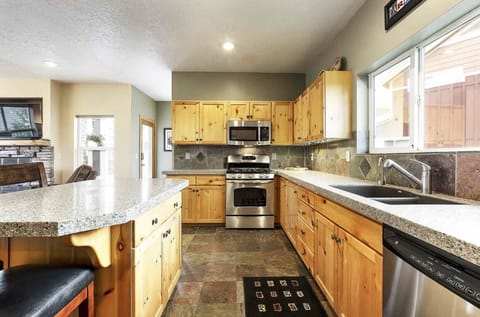 Kitchen area with lots of windows.