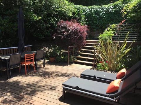 Soak up the rays or work outside in our private garden like deck