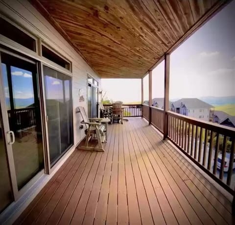 Large 300 Sq. ft. deck with table and four chairs.