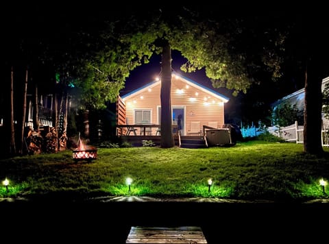 String lights give a nice ambiance. Or sit by the fire and listen to the loons.