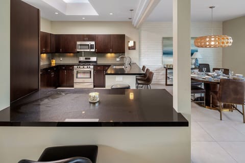 Fully Stocked Kitchen with two Counter areas for seating