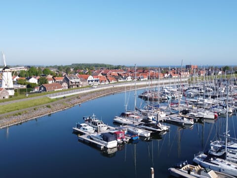 Water, Boat, Sky, Watercraft, Vehicle, Infrastructure, Building, Lake, Naval Architecture