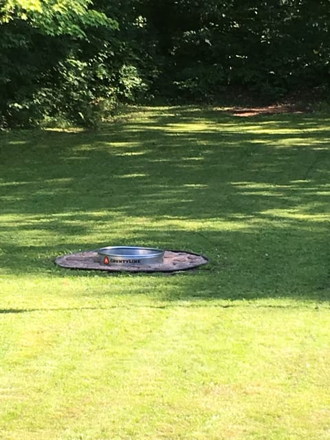 Hike up the hill through the woods ti the service trail