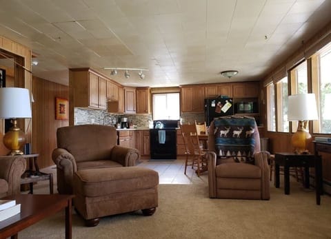 The view of the kitchen from the living room.