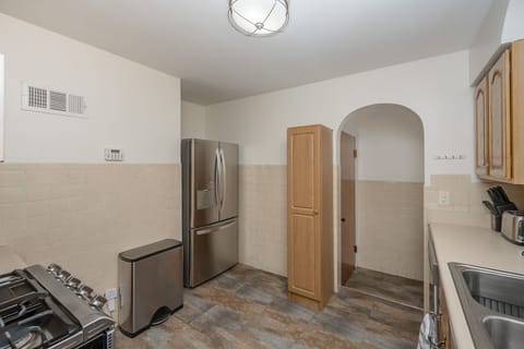 The fridge has filtered water and an ice maker in the freezer