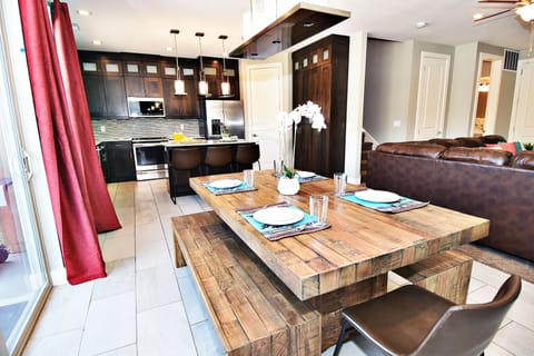 Ent 425 8 Seating Dining Area and a view of the Fully Equipped and Clean Kitchen