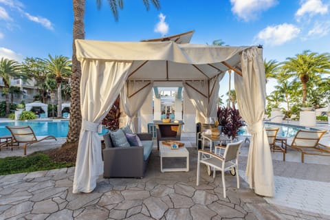 Relax in your own shaded cabana with seating and poolside views.