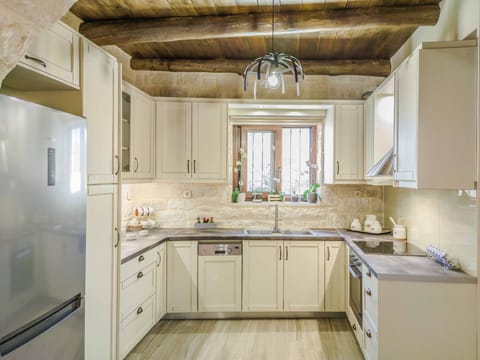 Fully equipped kitchen at the ground floor.