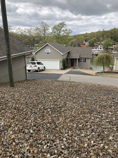 Home exterior plus empty lot included for parking