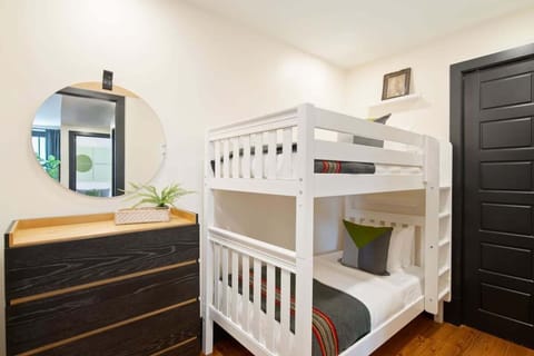 Bedroom 1 | 1 Twin-over-Twin Bunk Bed | Single-Level Unit | Hallway Access Bathroom