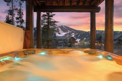 Lower level patio boasts Resort views and a private hot tub