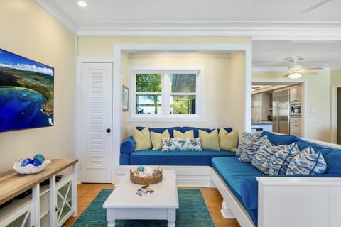 There's ample seating in the TV room for all to enjoy.