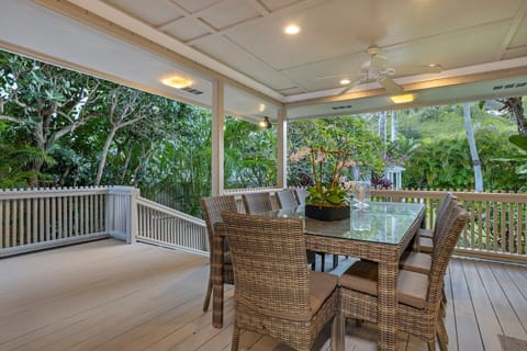 Enjoy a meal with loved ones on the deck with the island breeze.