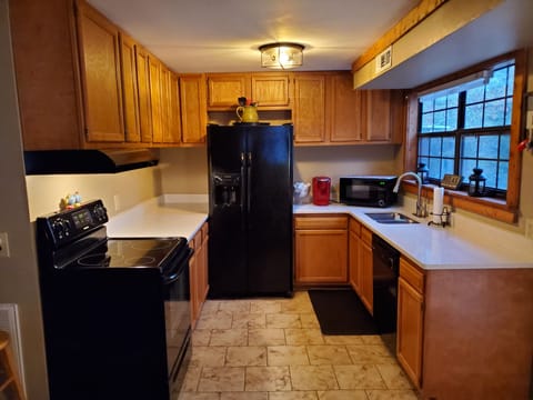 Kitchen with full size appliances.