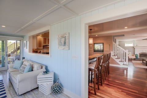 Sunroom looking into kitchen/living areas