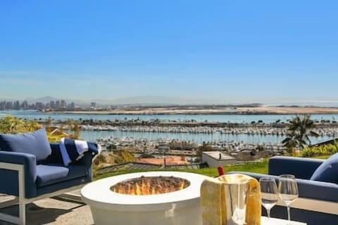 commanding view over Southwestern yacht club, and the bay. Views all the way past the downtown San Diego skyline down to the mountains in Mexico.
