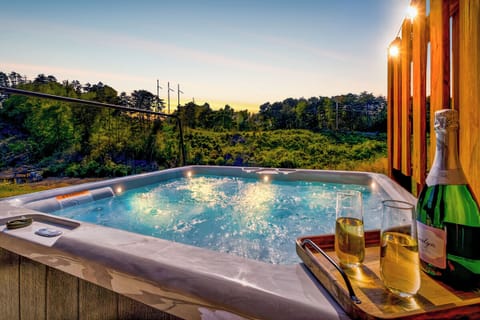 Our hot tub with a breathtaking view is the ultimate way to soak in serenity.
