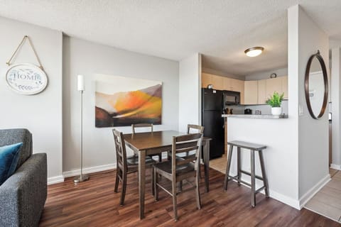 Dining area that seats four and a cute breakfast island.