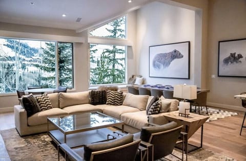 Living room with smart TV, fireplace, wet bar and beautiful views on main level 