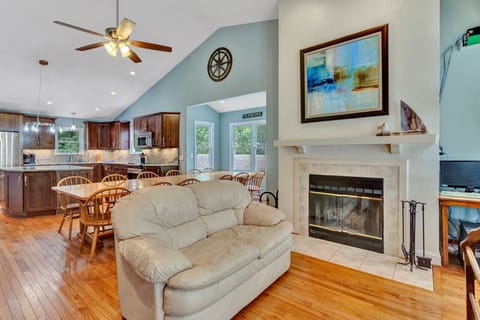 Inviting den with a big-screen TV and a selection of games, ideal for unwinding or hosting game nights.