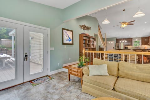 Inviting den with a big-screen TV and a selection of games, ideal for unwinding or hosting game nights.