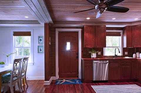 kitchen overlooks front porch deck